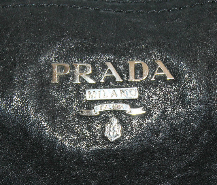 prada stamped logo