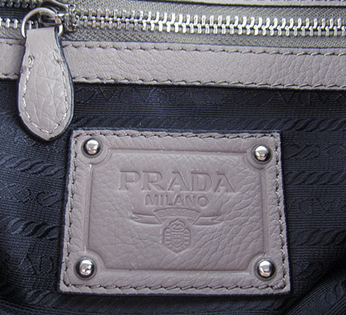 prada stamped logo